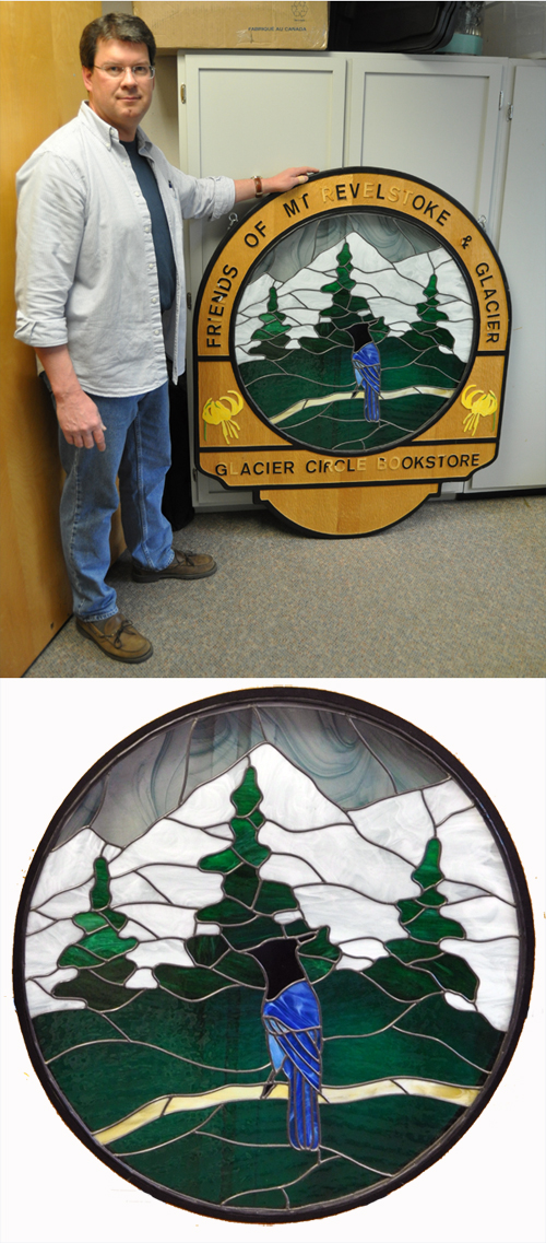 Glen O'Reilly poses with the the Friends of Mount Revelstoke and Glacier's beautiful wood and stained glass sign. The Friends are holding a silent auction, via The Current, until May 17. You can post bids using the comments section below. Please include your name and telephone number with your bid. This is a beautiful piece of history and it could be yours!  Bidding starts at $100. 