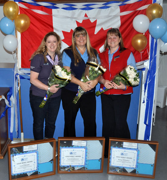 Local Girl Guides surprised Carol Fitchett, Tammie Johnson and Roma Threatful with roses and some special awards in honour of the years they have spent helping girls enrolled in the Guiding Movement. The event, held at the Knights of Pythias Castle on Third Street West, was a real surprise as Roma's daughter Andrea and some of the other Guides organized it in secret, lulling into believes the ceremony was something else. It wasn't really lying," Andrea said. "We were just creative about the truth." David F. Rooney photo