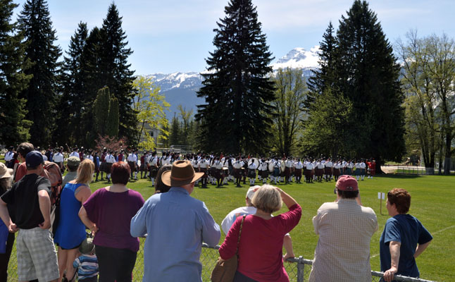 The bands from Revelstoke, Kelowna, Kamloops, Kalamalka, Nelson, Kimberley, Grand Forks, Trail and the Arran Campbell Memorial Youth Pipe Band from Kalamalka paraded down mackenzie Avenue to Queen Elizabeth Park. There, they took a few minutes to cool off then each band performed publicly. They each played a medley of songs and were graded on their performances. David F. Rooney photo