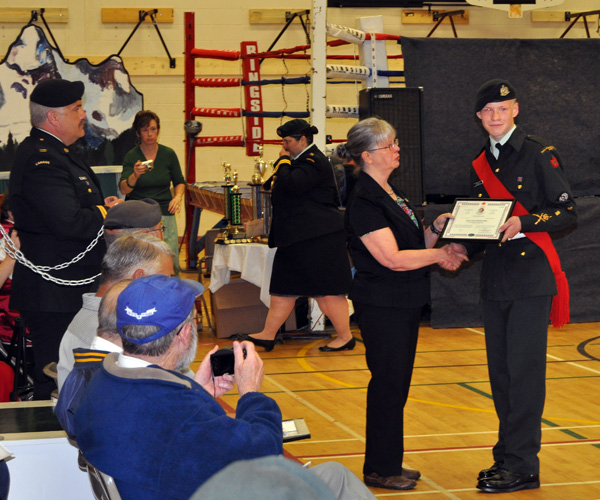 Sgt Alex Tilden accepts the Lord Strathcona Medal from Acting Mayor Linda Nixon. David F. Rooney photo