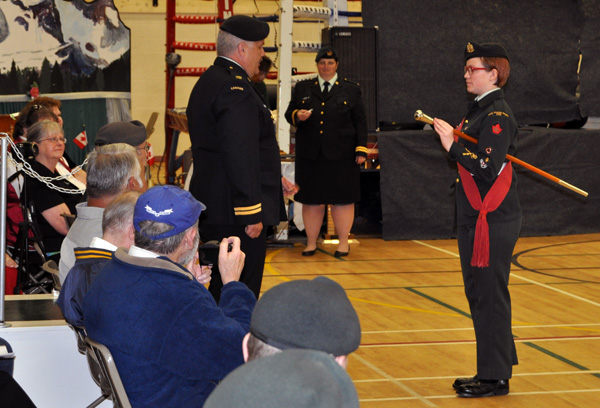 WO Zena Tilden stads at attention to receive the Army Cadet Service Medal. David F. Rooney photo