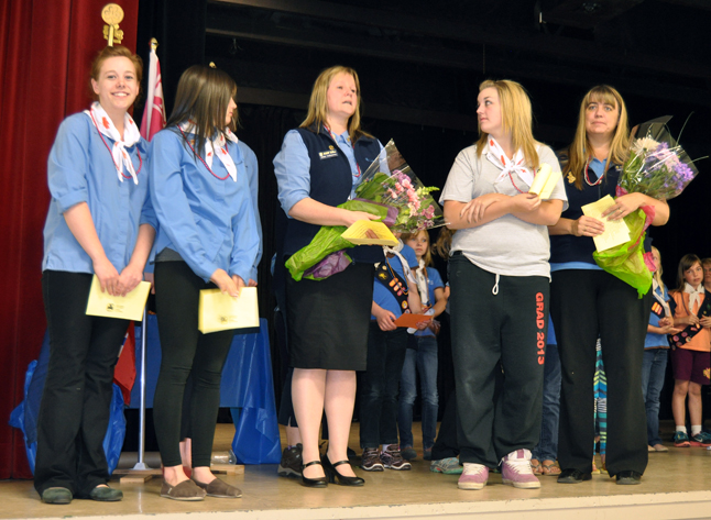 The girls also presented District Commissioner Roma Threatful and Tammie Johnson with flowers in recognition of their dedication to the Guiding Movement. David F. Rooney photo