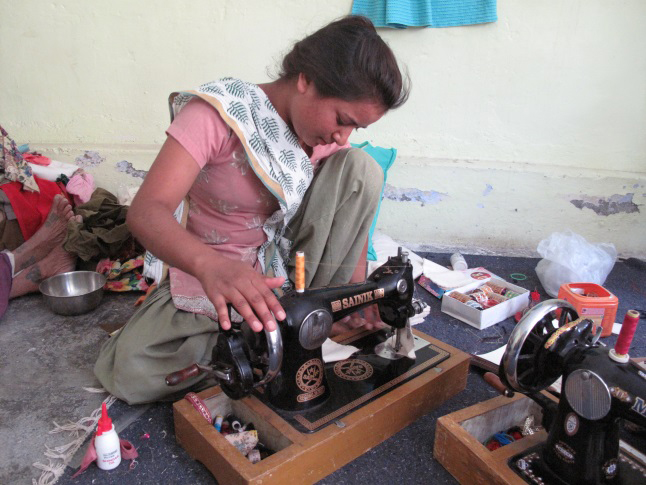 In Sainji, Neelam Rawat is one of the young women who sews dolls on a hand-operated sewing machine. This project, started by McFadyen, provides these women with an important source of income. Laura Stovel photo