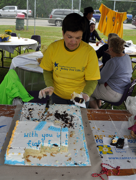 The 2013 Relay for Life was a wonderful exercise in community spirit with people like Maria Stagliano offering up free cake to passersby. David F. Rooney