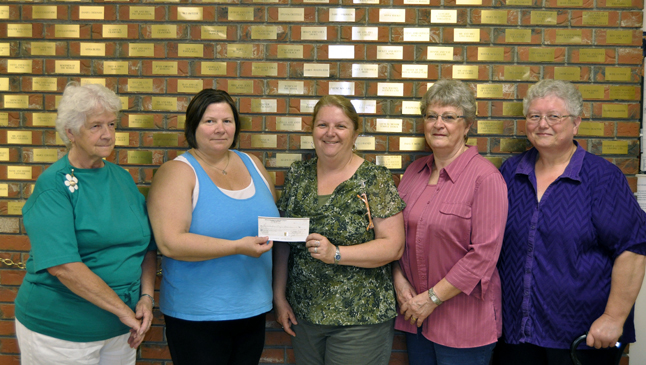 The Hospital Auxiliary once again demonstrated its ability to make a difference when Bev Wiege and Cheryl Fry (left) presented Jean Pedersen, Roth Boettger and Rose Lund of the Senior Citizens' Association with a $2,000 for the Volunteer Medical Transportation Program. David F. Rooney photo
