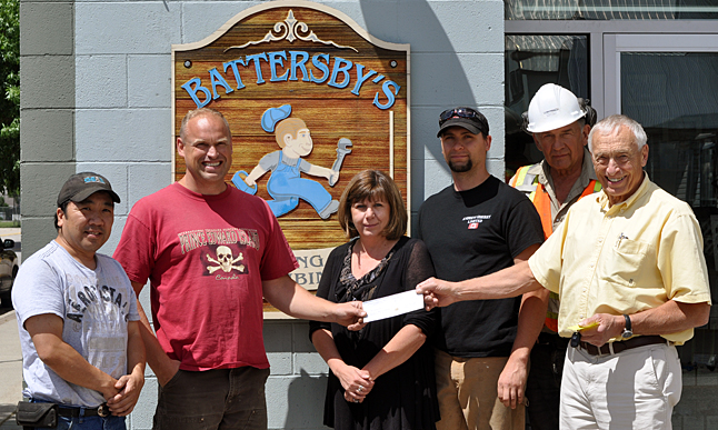 Battersby's Plumbing shareholders Glen Sakiyama (left), Rod Battersby, Cindy Allen and Zig Schmidt donated $200 to help fund a brand new scholarship Peter Bernacki and Geoff Battersby are establishing through the Revelstoke Community Foundation in the memory of the late Jim Ottenbreit. "Jimmy was very active in the community through the Business Development Centre and Minor Hockey," Peter said after this photo was taken. "I was a real sportsman and was president of the Golf Club, too." Geoff and Peter hope many people and businesses will contribute to the scholarship fund. If you'd  like to help them out you can reach Peter at 250-837-6062 or 250-837-1462. Geoff can be contacted at 250-837-4540 or 250-837-1930. You can also donate oline through canadahelps.org or at www.revelstokecf.com/communityfoundation/. Be sure to indicate that your donation is in memory of Jim so that it goes toward the scholarship. David F. Rooney photo