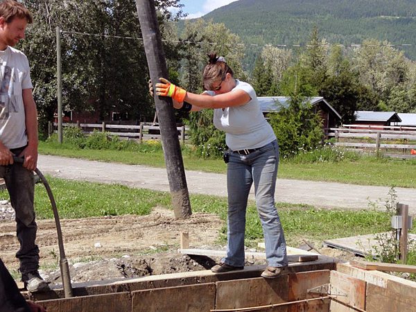 Here, Tanya Secord guides the nozzle in for a sizeable injection of concrete. Photo courtesy of Tanya Secord