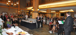 Here's a panoramic view of the party there were many more guests to the left of the image. Anne Cooper is seated on the left with her sister-in-law Donna Lee. Click on the image to see it at full size. David F. Rooney photo