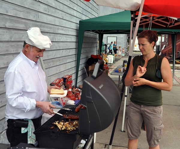 And look who came out of retirement to serve up hot dogs and smokies — Denis Berarducci!  David F. Rooney photo