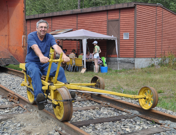 James Walford demonstrates how a velocipede worked. The simple machines allowed CPR staff to travel along its rail lines. David F. Rooney photo