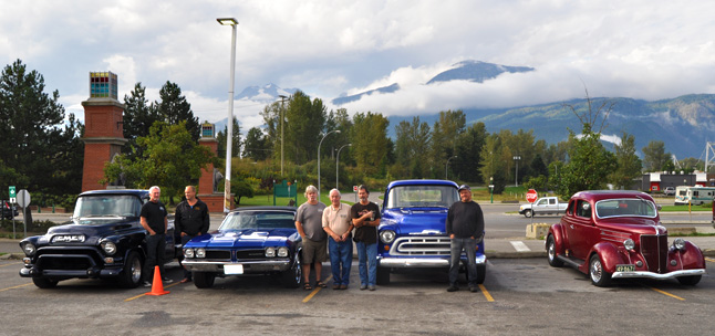 The vintage car buffs — Ken Howe, who owns a 68 Beaumont, Bob Elliot of McBride, who possesses a 57 Chevy, Bod Battersby and his 63 Parisienne, Jim Block and his 36 Ford, Donnie Hawker and his 32 Ford and Mark Roberts and his 55 GMC — posed at Tim Horton's on their way to Nelson on Friday for a weekend car show. There were to be about 350 vehicles in the show and shine. David F. Rooney photo