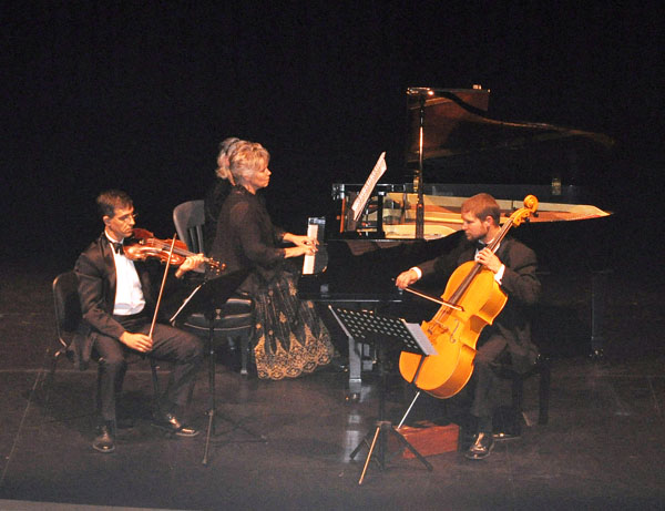 The Kamloops Symphony Orchestra's Naomi Cloutier played piano, Cvetozar Vutev stroked the violin and Martin Krátký the cello during their performance of works by Brahms, Rachmaninov and Dvořák at the Revelstoke Performing Arts Centre on Thursday evening. David F. Rooney photo