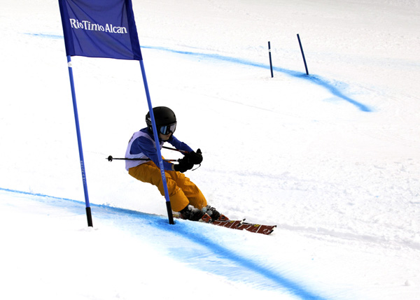 A young skier zips past the blue gate. Rob Buchanan photo