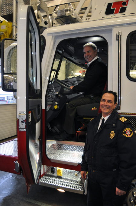 Mayor David Raven tries out the driver's seat of the City's new 100-foot aerial ladder truck. He said he was gratified that the City got it at a bargain rate. The truck, designated as Ladder Truck No. 6, replaces the Fire Rescue Service's 36-year-old  Scot Snorkel truck, which had only a fraction of the aerial reach of the new vehicle. No. 6 can reach eight storeys high, Chief Rob Girard said. That makes it ideal for rescuing trapped people. David F. Rooney photo