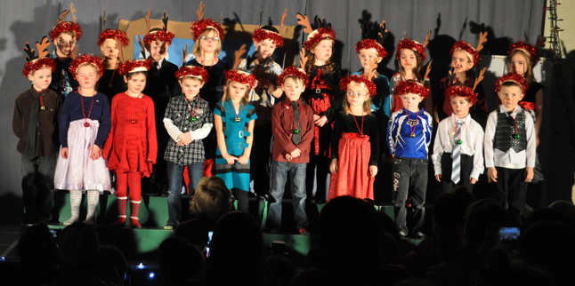 Ms. Rota's Grade 1/2 Class were all dressed up for their performance of Must Be Santa. David F. Rooney photo