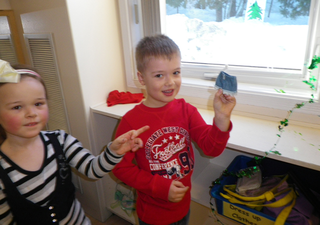 Kindergartener Cruz shows the blue shorts left behind by the leprechaun that visited their class last week. Melinda Brown photo courtesy of CPE Principal Ariel McDowell