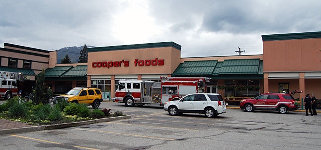 Fire Rescue personnel were out in force at Cooper's Foods on Thursday, May 29, when shoppers and staff were evacuated from the store because of a suspected freon gas leak in the refrigeration system. No one was injured by the afternoon leak and the store was to reopen later in the day. David F. Rooney photo