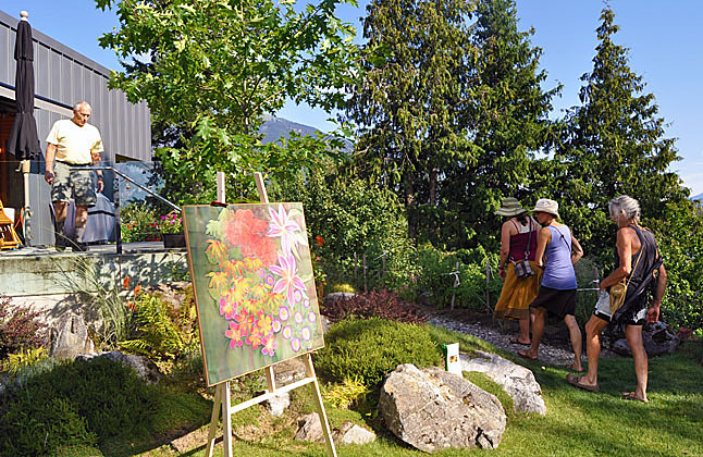 The North Columbia Environmental Society’s (NCES), Local Food Initiative group is inviting local gardeners and artists to participate in the second annual Garden Art Tour, to be held on Saturday, July 26. Last year's show was gorgeous and popular. Here, Geoff Battersby (left) welcomes visitors to his home last year's tour. Revelstoke Current file photo