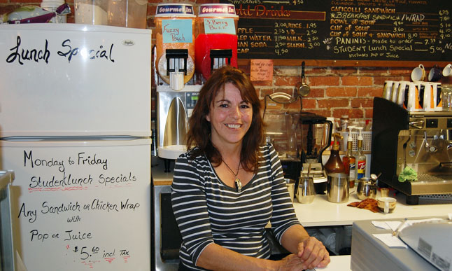 Conversations Coffee House owner Karen Powers has more than the lunch special on her mind these days; in  fact, she'd like to introduce some political specials this fall when she takes a run at a City Council seat. David F. Rooney photo