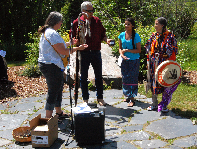 Storytelling Festival MC Jackie Cole (left) presents traditional gifts to Sinixt President Shelly Boyd (right), her former husband and Arrow Lakes Facilitator Virgil Seymour and their granddaughter Jahmilah Seymour at the opening of the festival at Centennial park on Saturday, June 21. David F. Rooney photo