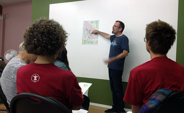 Teacher Chris Parkin points to Sinixt place names on a map. Laura Stovel photo