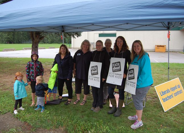 Moms Sarah Whyte (left) and Britt Hunchak (right) came out to show their support for teachers on the picket line at Columbia Park Elementary. David F. Rooney photo