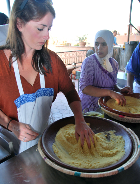 Making couscous. After each steaming, you swirl it with water and a tiny bit of oil. Leslie Savage photo