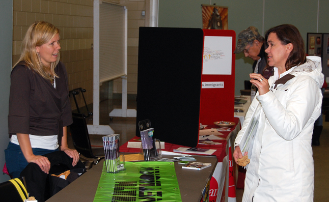 Megan Shandro of the Youth Stoke Network chats with Kim McTaggert at the Volunteer Fair. David F. Rooney photo