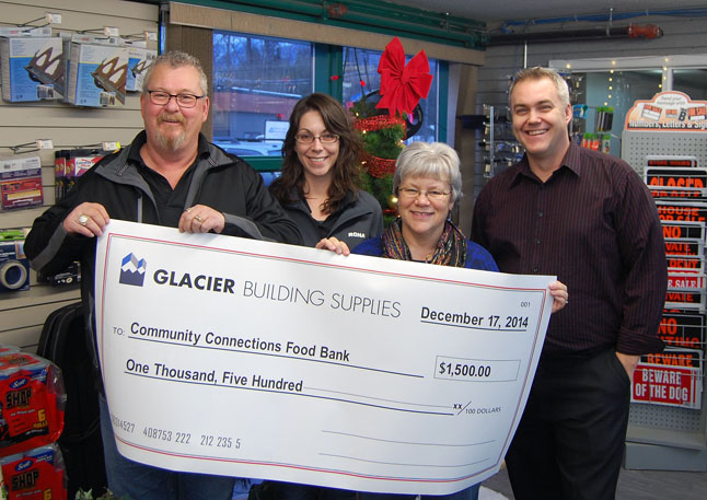 RONA/Glacier Building Supplies helped out big time with this “big-ass cheque” for $1,500 gathered during its annual Contractors’ Night Party, held this year last Thursday, December 11. Here, the monster cheque is held by Bobby McClelland (left), Tasha Charmont, Patti Larson and Steve Smith. Way to go, RONA. David F. Rooney photo