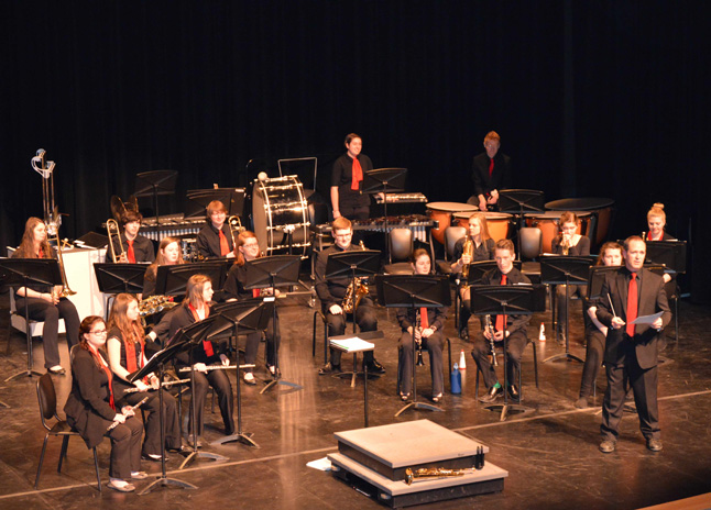 Music teacher and conductor Jim Redding (right) introduces the Senior Band. Andy Pfeiffer photo