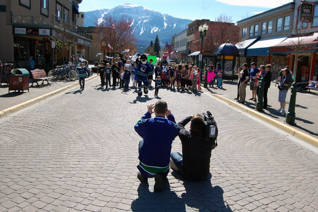 The Canucks are, as everyone who isn't living under a rock knows, locked in a Stanley Cup play-off battle with the Calgary Flames so a BCTV television camera crew accompanied Fin on a quick tour of several Interior communities to whip up come public support. David F. Rooney photo