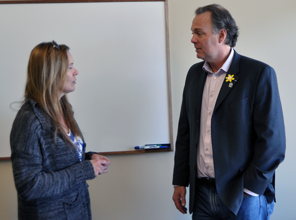 Shelley Sharpe talks with MLA Norm Macdonald at the Chamber luncheon held at the Edward Jones new office on Orton Avenue on Wednesday, April 8. Sharpe and her husband, David Evans, are developing a unique treetop hotel on Camozzi Road. David F. Rooney photo