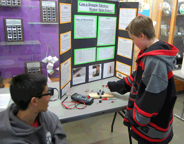 Nolan Gale's simple electric motor attracted the attention of other gadget-minded students. David F. Rooney photo