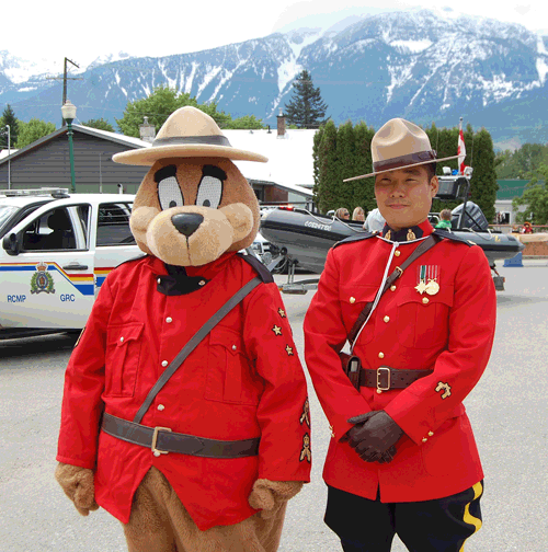 If you dropped by the RCMP detachment at noon on Thursday, May 14, for the lunch-hour BBQ you probably met these characters — Safety Bear and Const. Mike Park. David F. Rooney photo