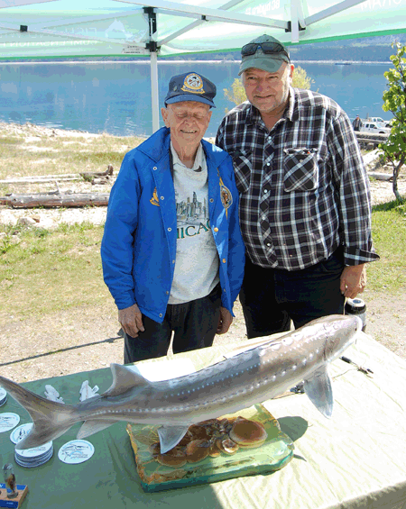 SHELTER BAY —  Jack Carten and Kim Doebert were two of thelong-time Rod & Gun Club members who came to help out at the release. David F. Rooney photo