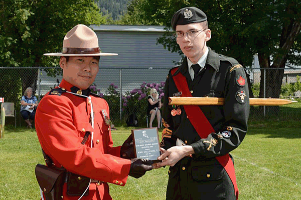 CWO Trevor Gallicano receives the Outstanding Leadership Award from RCMP Const. Mike Park. Wayne Emde Photography
