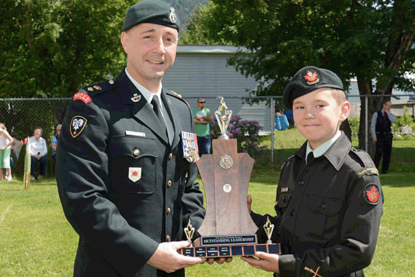 LCpl William Irwin receives the Best Dressed on Parade Award from Lieut.-Col. Mason Stalker, a decorated Afghan War veteran. The Revelstoke-born professional soldier has risen to command one of Canada’s elite infantry units — the First Battalion of the Princess Patricia’s Canadian Light Infantry. Wayne Emde Photography