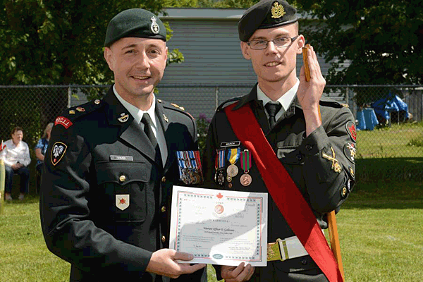 MWO Galen March receives the coveted Lord Strathcona Medal from Lieut.-Col. Mason Stalker. Wayne Emde Photography