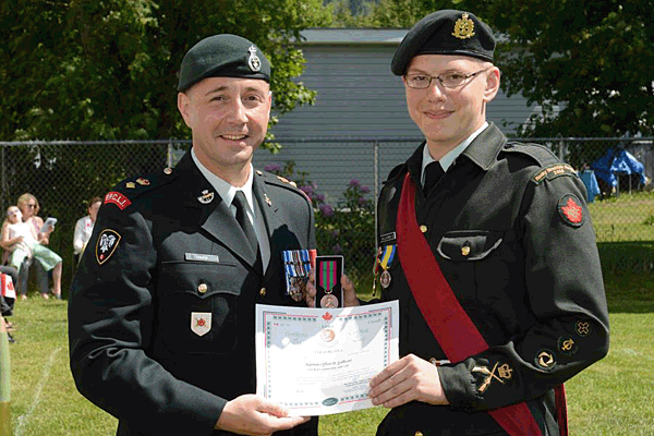 WO Darren Gallicano receives Lord Strathcona Medal from Lieut.-Col. Mason Stalker.  This medal is the highest award that can be bestowed upon a Canadian cadet in recognition of exemplary performance in physical and military training. Wayne Emde Photography