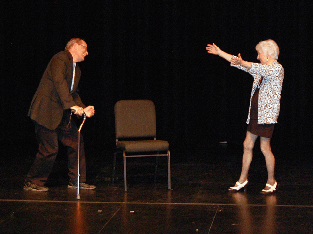 Joyce MacLean shows a little leg as she sings Just Another Woman in Love to a geriatric-looking John Teed. David F. Rooney photo