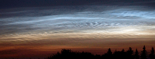 What are noctilucent clouds? While their name sounds vaguely apocalyptic, these cloud formations are actually a globally treasured phenomenon. Photo courtesy of Kate Lemke