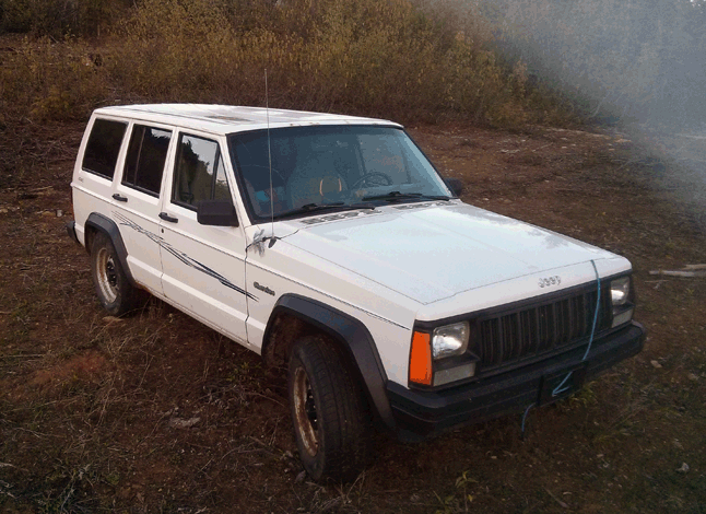 This white 1996 Jeep Cherokee is registered to Robert Cline Kinee. It was found abandoned on Big Mouth Creek Road, a deactivated logging road, and the Mounties think it has been there since October 2014. Photo courtesy of the Revelstoke RCMP