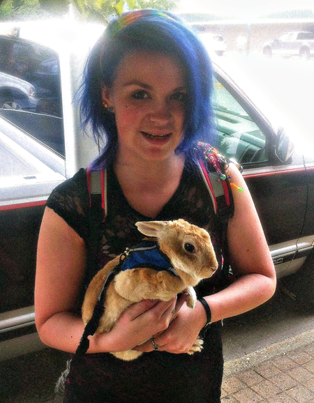 Here's something you don't see every day: a bunny being taken for a walk downtown. Xena Tilden brought her eight-year-old pet Hässien for a walk downtown on Tuesday because she needed to visit the Revelstoke Credit Union. It wasn't the first time she brought her rabbit out for a stroll. As you can see, Hässien has her own harness and leash and is quite responsive to her mistress. While Xena was inside tending to her affairs she tied the well-groomed bunny to a tree under the watchful eye of her friend Ethan Todds. As passers-by stopped and smiled at the sight Hässien nibbled on a couple of lweeds growing between the paving stones set around the sapling in front of the credit union. David F. Rooney photo