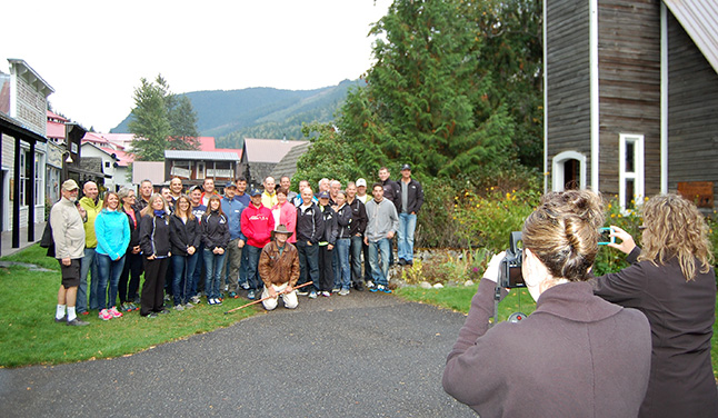 Smile! The bicyclists in this year's Cops for Kids ride pose for a group photo at Three Valley Gap's Ghost Town on Thursday. David F. Rooney photo