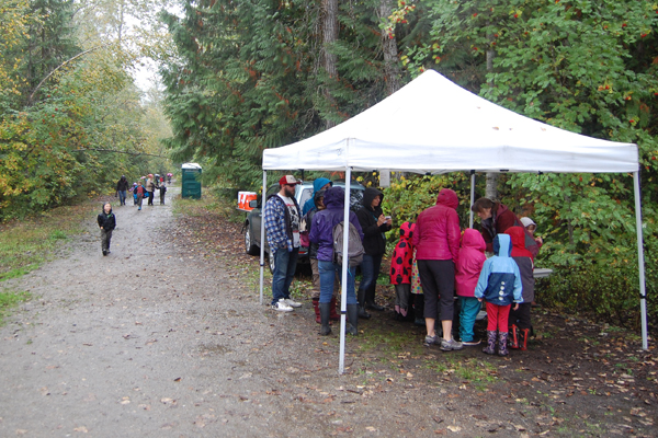 Rain didn't stop children from across the city from visiting Bridge Creek on Friday for the annual Kokanee Fish Festival. David F. Rooney photo
