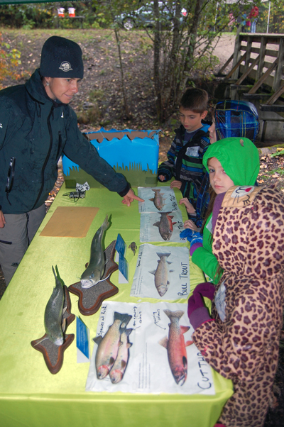 Alice Weber of Parks Canada enjoyed teaching the kids bout the different species of salmonid found in our river, streams and lakes. David F. Rooney photo