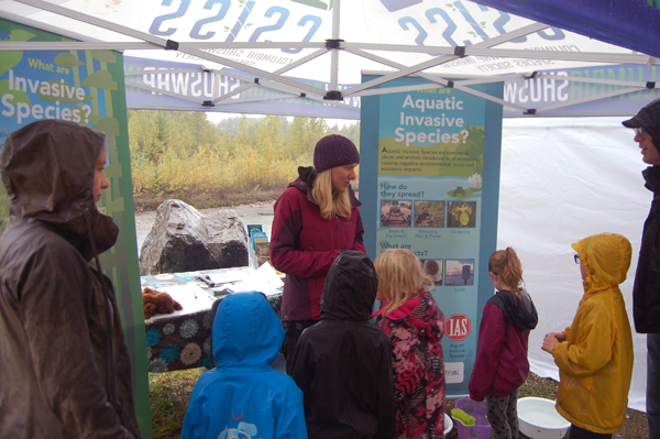 Laura Gaster of the Columbia Shuswap Invasive Species Society talks to the kids about some of the strange plants and animals that are threatening our lands and rivers. David F. Rooney photo