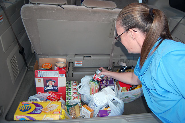 All the food Shawn and her husband and girls collected ended up in the back of their van. David F. Rooney photo
