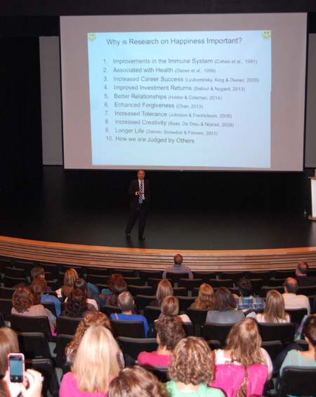 Neurologist Dr. Mark D. Holder of UBC Okanagan talks to Revelstoke's teachers about his research into the state of happiness and how it affects people. His presentation at the Performing Arts Centre was the highlight of the teachers' first professional Development Day of the year. School resumes on Tuesday, September 8. David F. Rooney photo