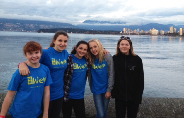 Andie Reynolds, Amy Des Mazes, Cassidy Legeboko, Alexis Larsen, and Sam Brown at Kitsilano Beach for We Day, 2015. Ms. Tara Johnson photo. Caption by Emily MacLeod and Amelie  